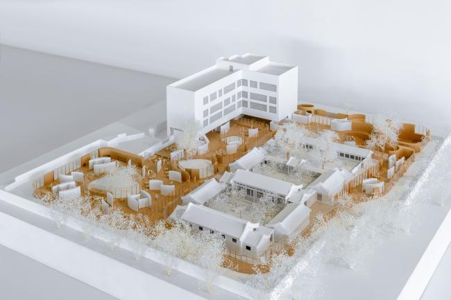 BIM建筑|MAD为北京四合院设计漂浮屋顶幼儿园，孩子们可以“上房揭瓦”啦