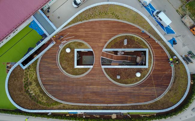 BIM建筑|混凝土与木板组成的弧形乐土：波兰幼儿园