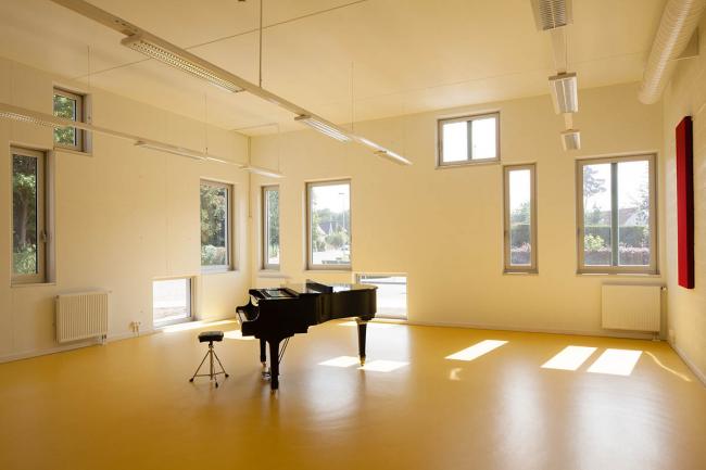 BIM建筑|将巨匠经典的音符涂抹颜色，复刻在立面上——音乐与建筑的融会之作