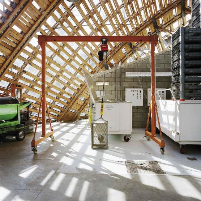 BIM建筑|一颗嵌进年夜地的琉璃鹅卵石——比利时品牌木材产业基地