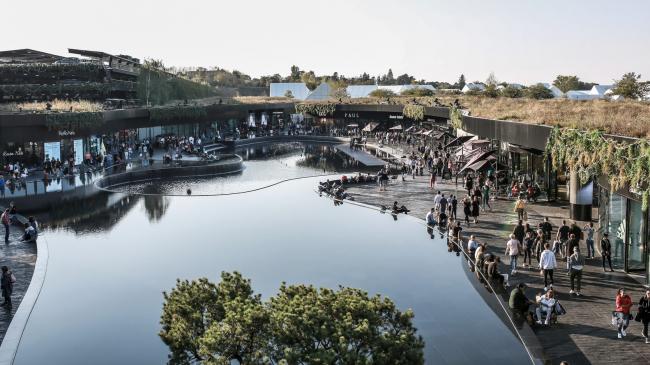 BIM建筑|法国里昂奥特莱斯，白色斗室子组成村落 / Gianni Ranaulo Design