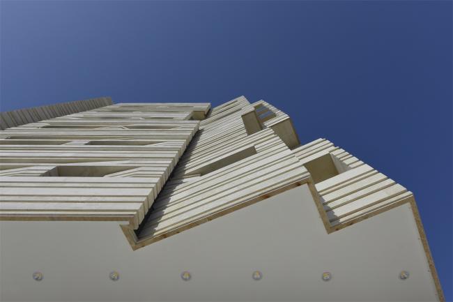 BIM建筑|如同被风化的粗粝岩石：阿维尼室第楼 | Heram建筑事务所