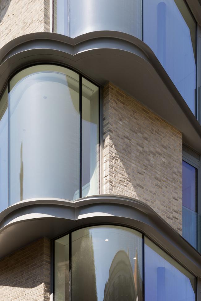 BIM建筑|IV Castle Lane 公寓，曲线转角柔化城市标准 / DROO