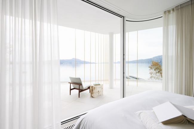 BIM建筑|湖边绽开的白色花瓣：意年夜利滨湖度假屋 / Design Haus Liberty