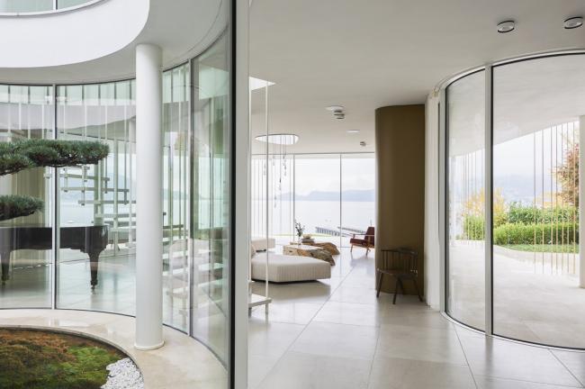 BIM建筑|湖边绽开的白色花瓣：意年夜利滨湖度假屋 / Design Haus Liberty