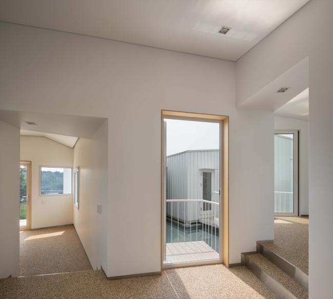 BIM建筑|碧湖之畔，丛林之间：飘浮立方体室第 / Younghan Chung Architects