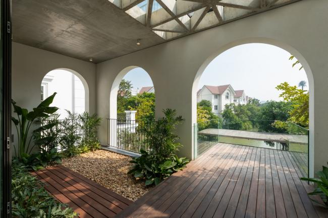 BIM建筑|拱窗围廊下营造室内庭院：越南 AD8 别墅 / Nemo Studio