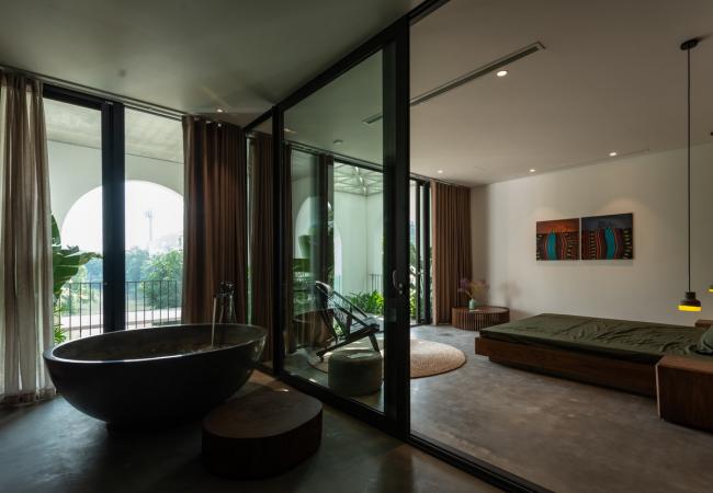 BIM建筑|拱窗围廊下营造室内庭院：越南 AD8 别墅 / Nemo Studio