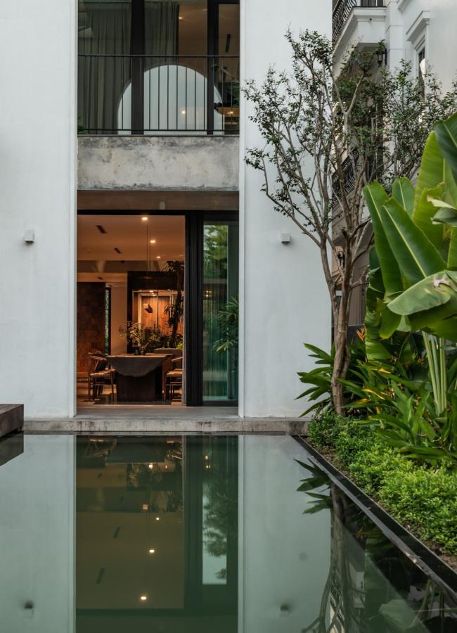 BIM建筑|拱窗围廊下营造室内庭院：越南 AD8 别墅 / Nemo Studio