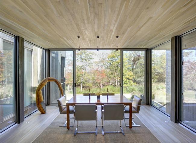 BIM建筑|高挑桩基创造的架空体量——西北港口住宅 / Bates Masi Architects