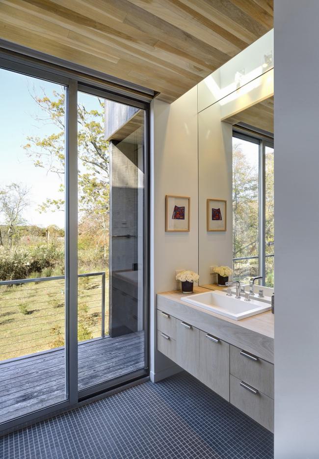 BIM建筑|高挑桩基创造的架空体量——西北港口住宅 / Bates Masi Architects