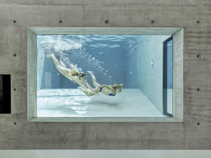 BIM建筑|水与混凝土协奏出的生命之歌：22º 别墅 / Dreessen Willemse Architecten