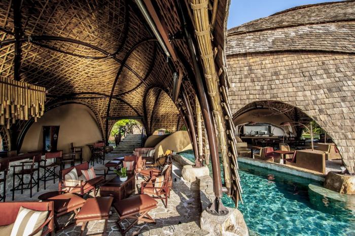 BIM建筑|海岸沙滩巨石下的原始洞穴：斯里兰卡帐篷酒店 / Nomadic Resorts