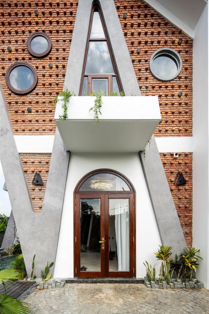 BIM建筑|纵向贯通的“A”字斜柱结构，越南会安康成别墅 / VRA Design