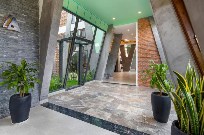 BIM建筑|纵向贯通的“A”字斜柱结构，越南会安康成别墅 / VRA Design