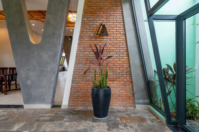 BIM建筑|纵向贯通的“A”字斜柱结构，越南会安康成别墅 / VRA Design