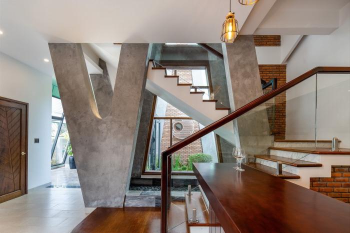 BIM建筑|纵向贯通的“A”字斜柱结构，越南会安康成别墅 / VRA Design