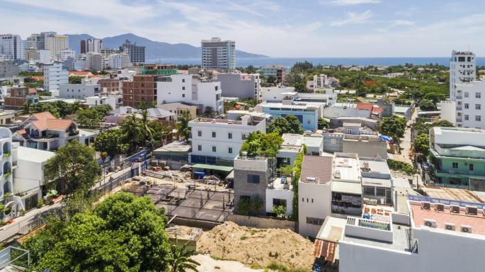 BIM建筑|错落的盒子，可呼吸的“绿色之肺”：岘港住宅 / 武重义建筑事务所