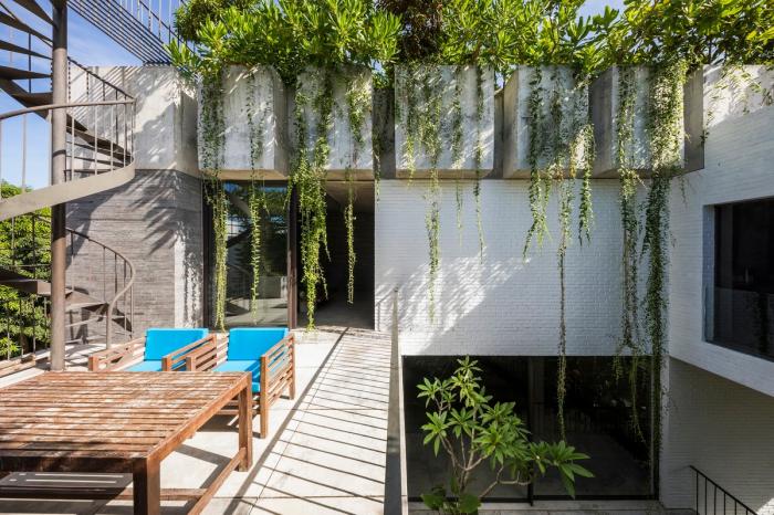 BIM建筑|错落的盒子，可呼吸的“绿色之肺”：岘港住宅 / 武重义建筑事务所