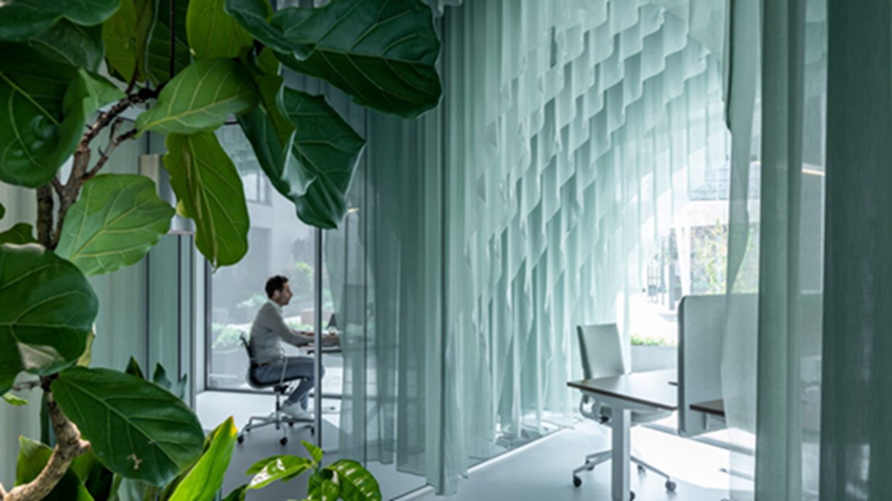 BIM建筑|“超越空间工作室”用织物覆盖阿姆斯特丹办公室