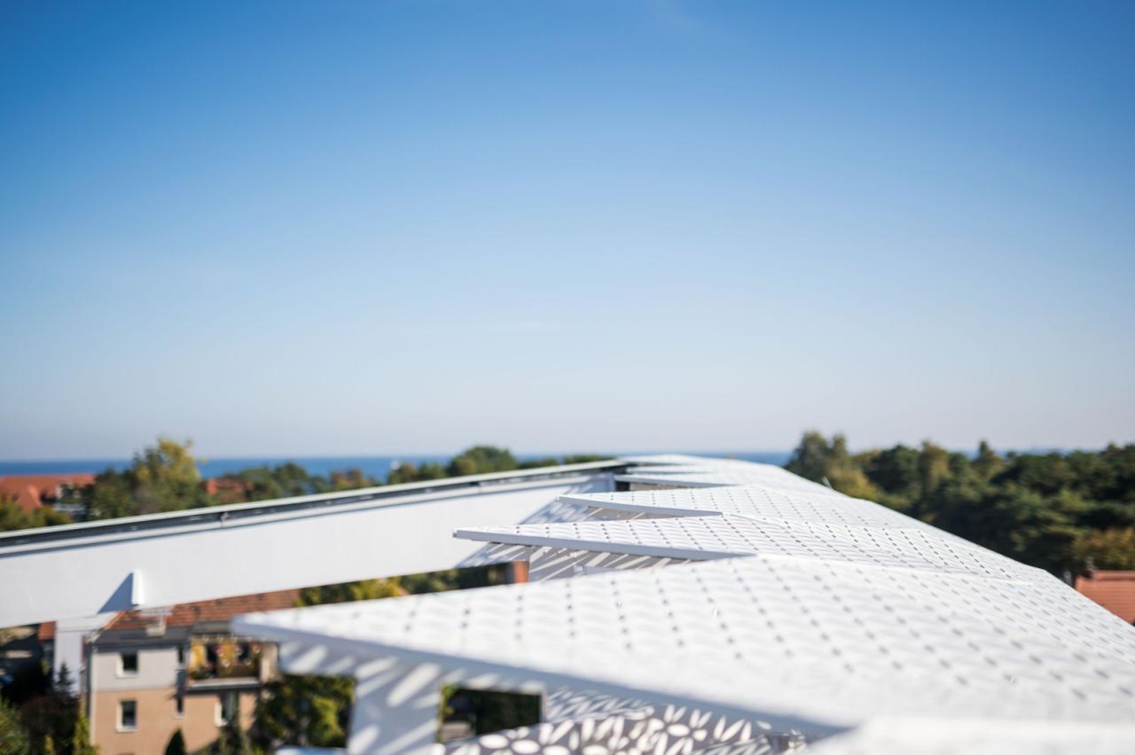 BIM建筑|疗养小镇的‘浪潮’，医疗研究中心 / FAAB