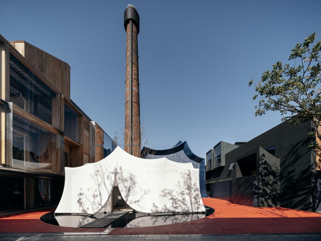 BIM建筑|青丘和白崖：仿佛海浪一般起伏的蓝色山丘下是我们“摇摇摆摆的人间” / Wutopia Lab