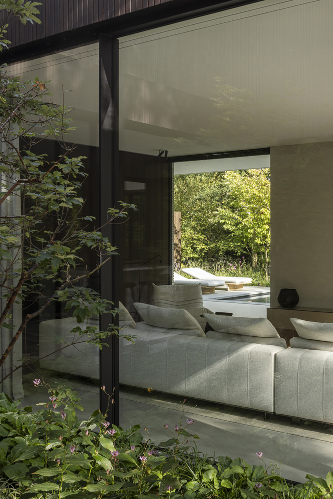 邂逅荷兰海岸隐匿别墅：一场自然、建筑与艺术的盛宴设计