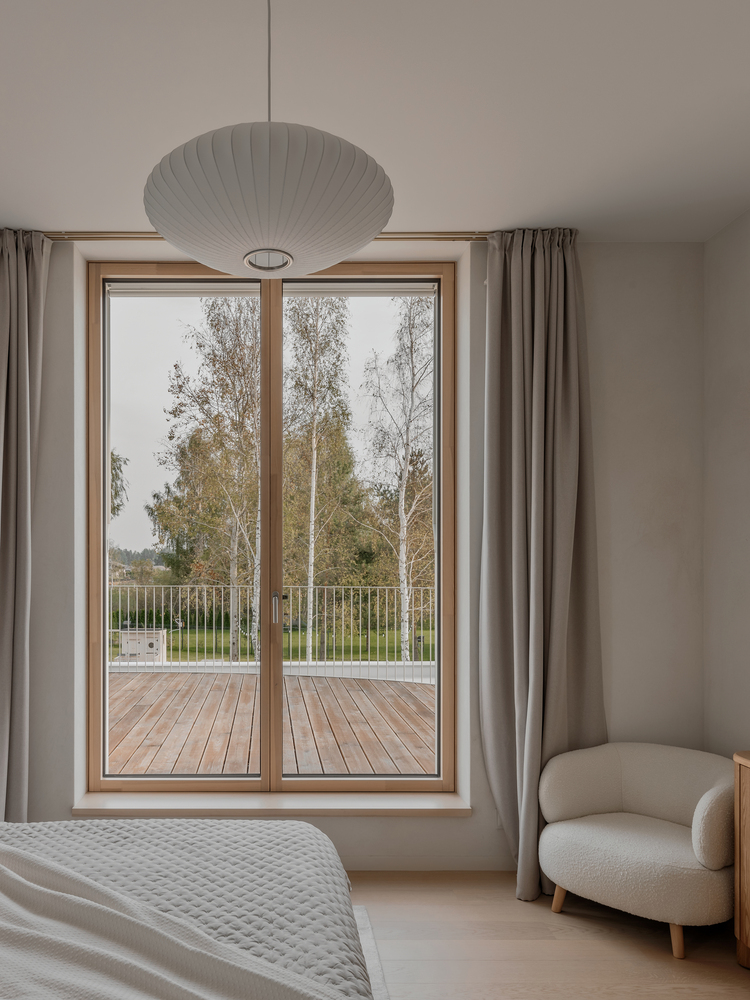 温暖自然流畅细节简洁线性对称韵律的极简别墅设计