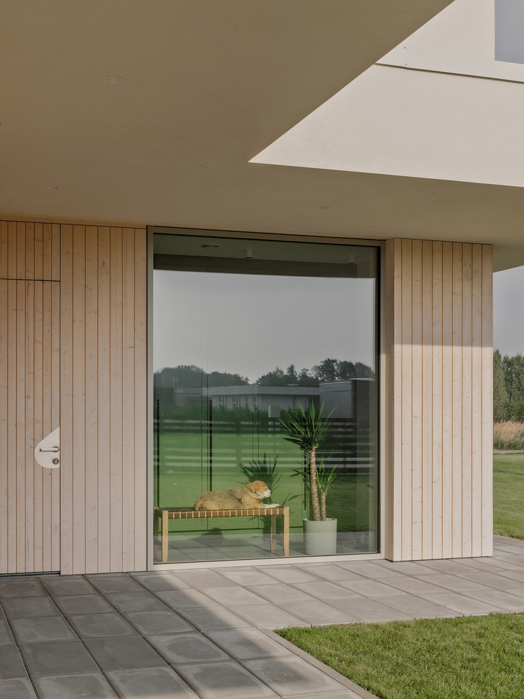 温暖自然流畅细节简洁线性对称韵律的极简别墅设计