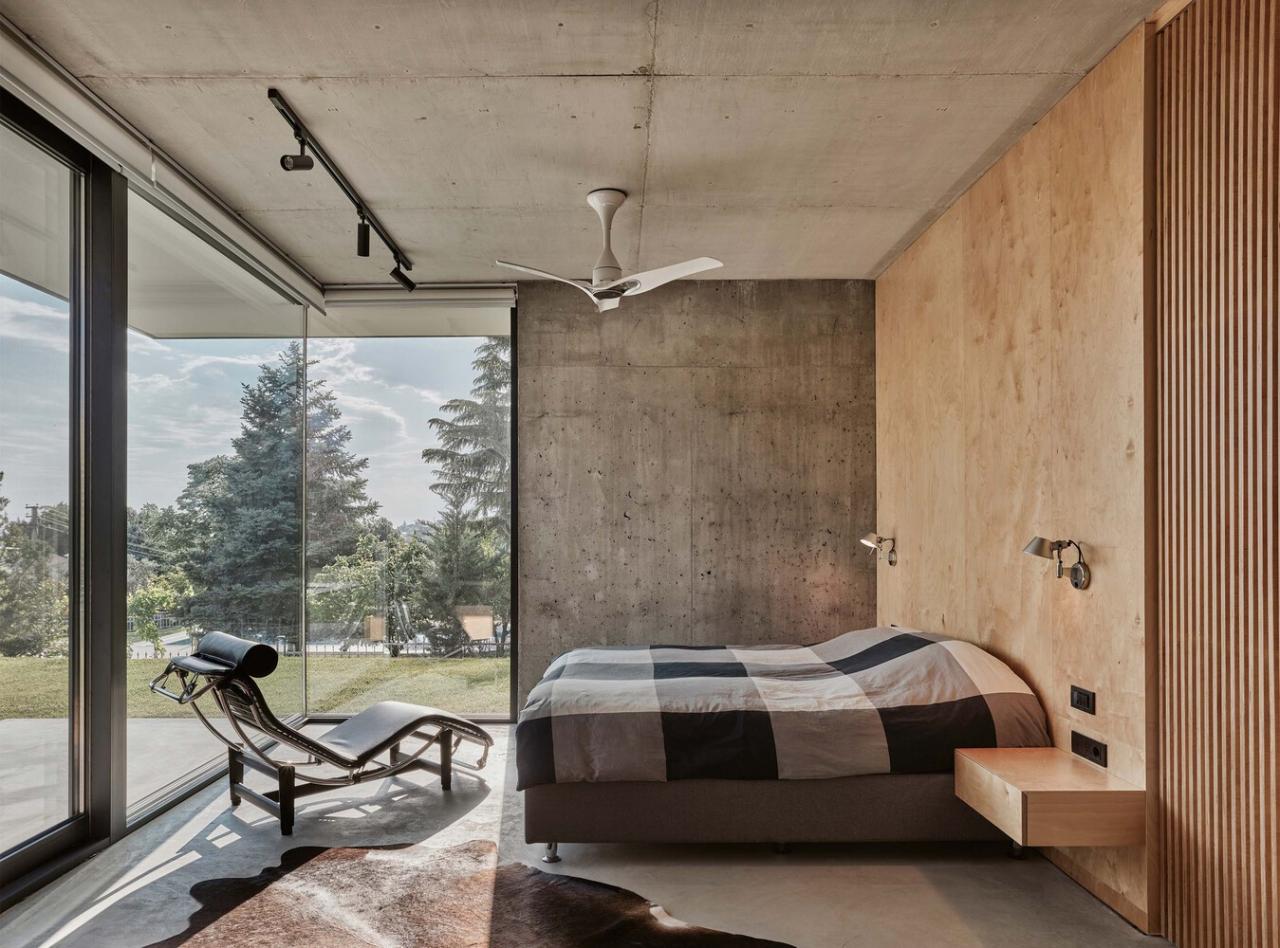 森林流经的房子混凝土和玻璃相结合度假别墅设计