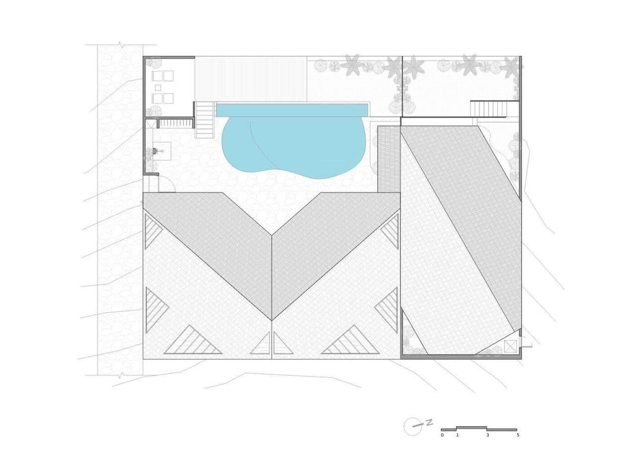 诗意森林里的侘寂之境翻转屋顶下的自然别墅设计