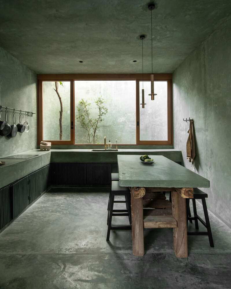 从天然井与洞穴汲取灵感光影交织下感知时间的度假屋设计