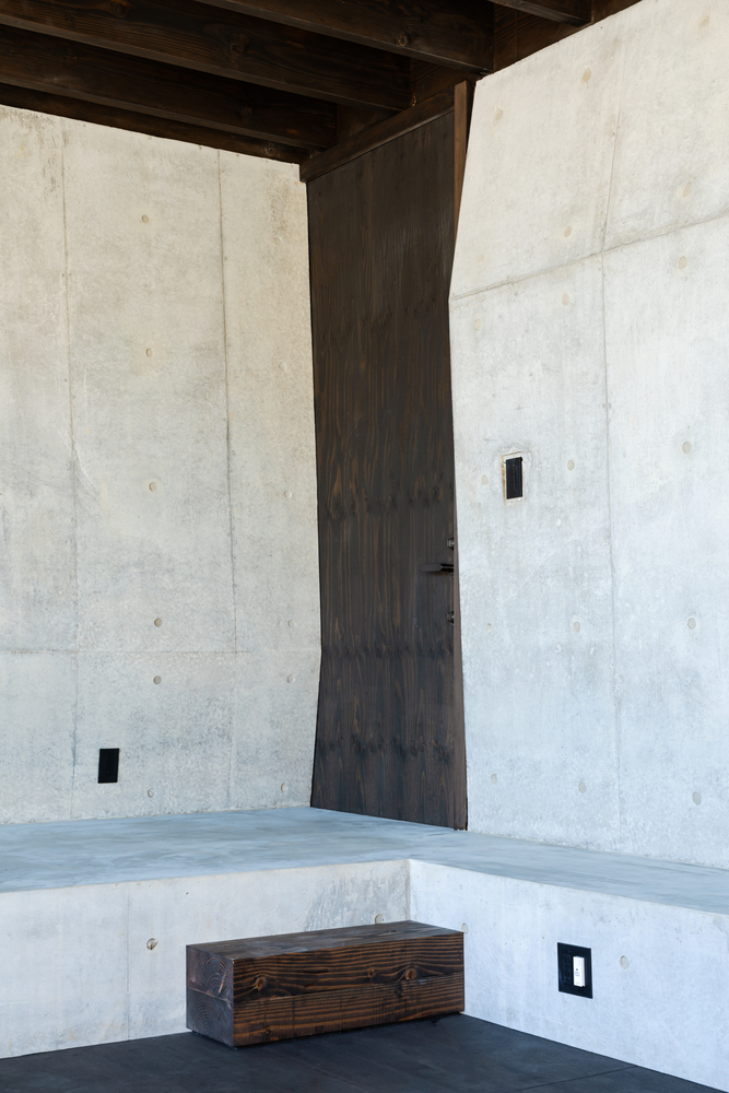 混凝土与木材交织的独特神秘体验静谧栖居的住宅设计