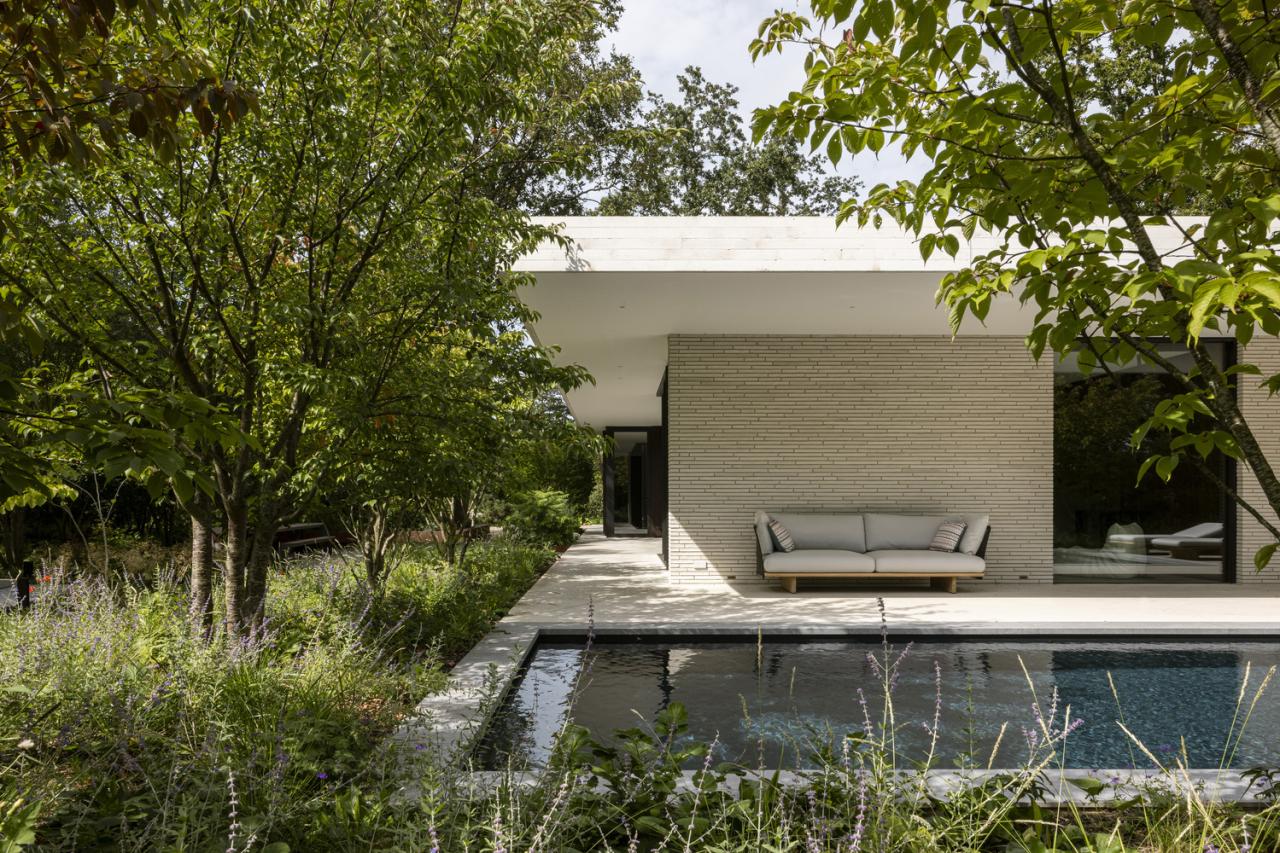 邂逅荷兰海岸隐匿别墅：一场自然、建筑与艺术的盛宴设计