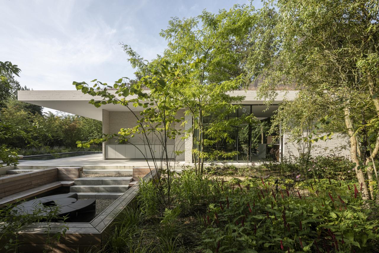 邂逅荷兰海岸隐匿别墅：一场自然、建筑与艺术的盛宴设计