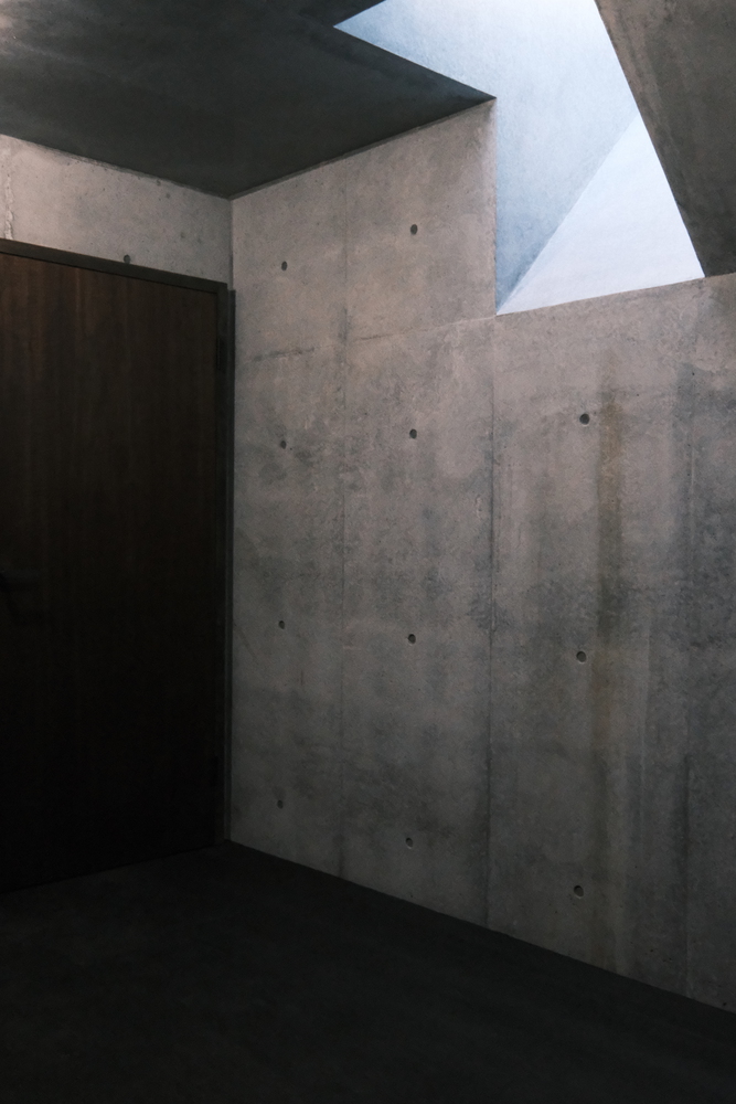 混凝土与木材交织的独特神秘体验静谧栖居的住宅设计