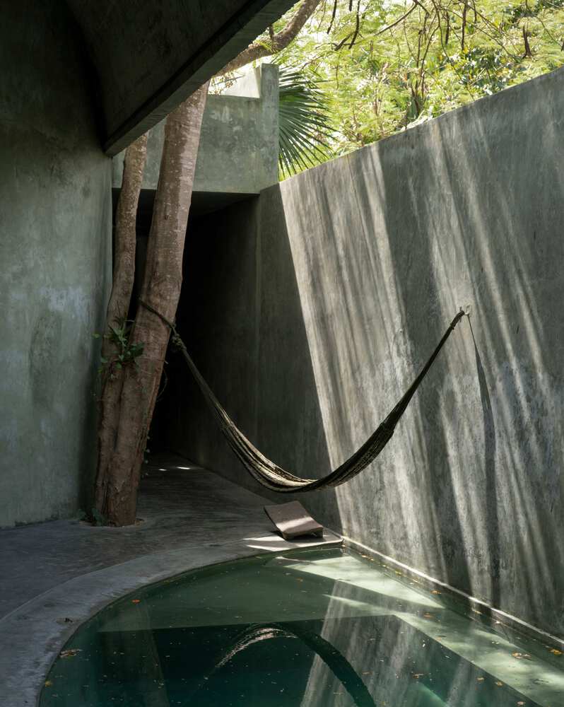 从天然井与洞穴汲取灵感光影交织下感知时间的度假屋设计