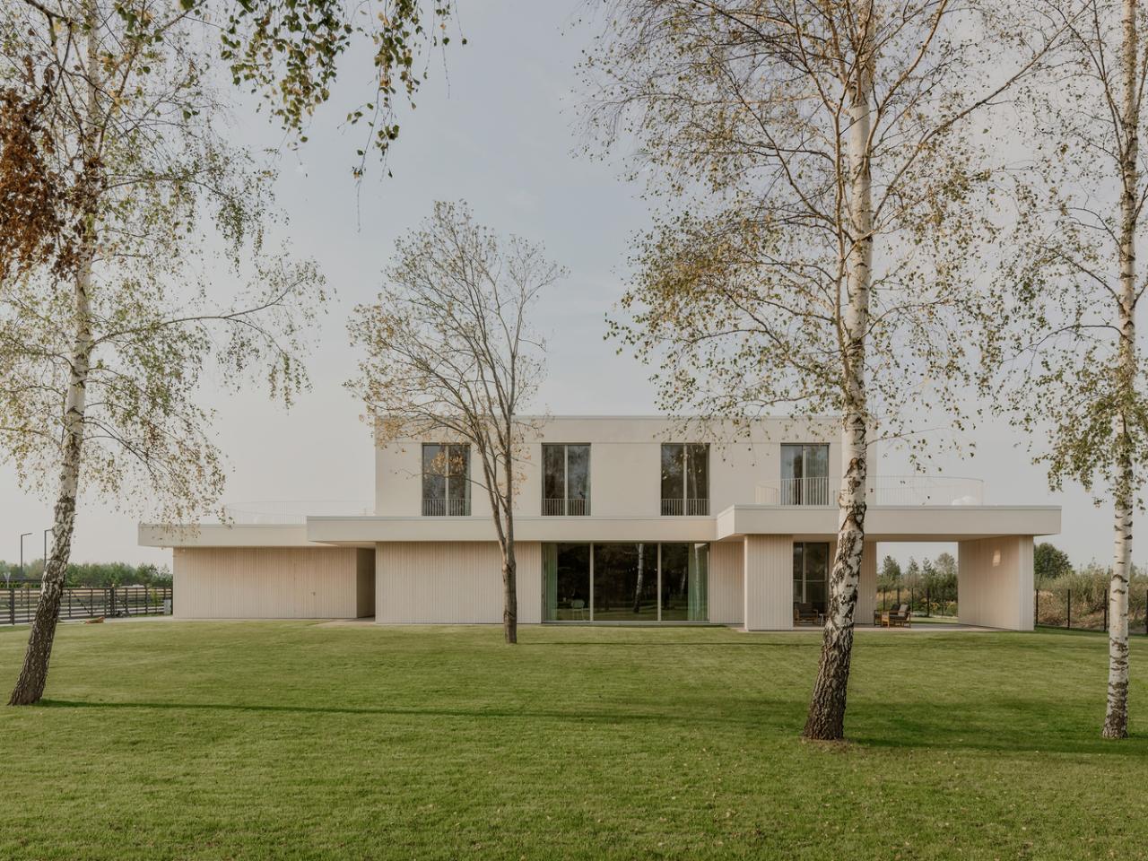 温暖自然流畅细节简洁线性对称韵律的极简别墅设计