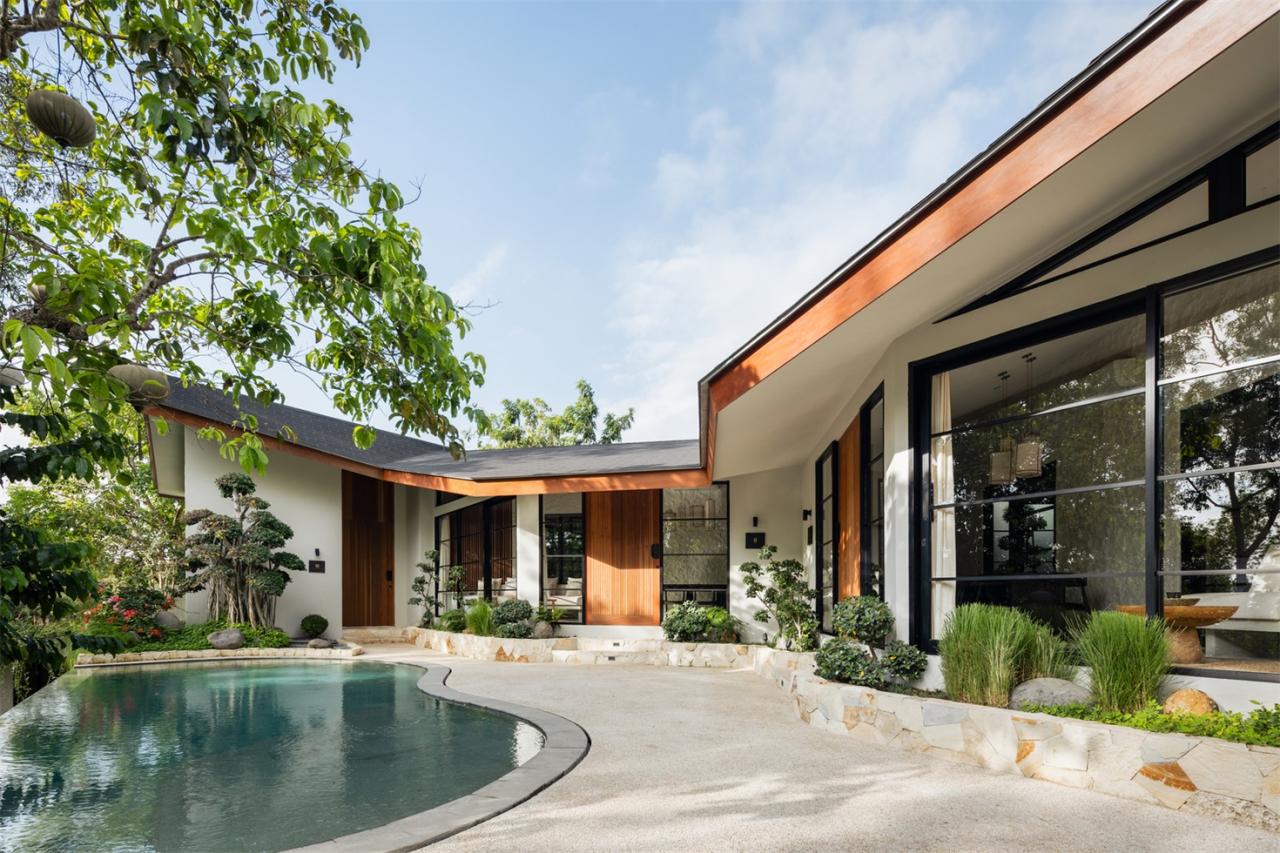 诗意森林里的侘寂之境翻转屋顶下的自然别墅设计