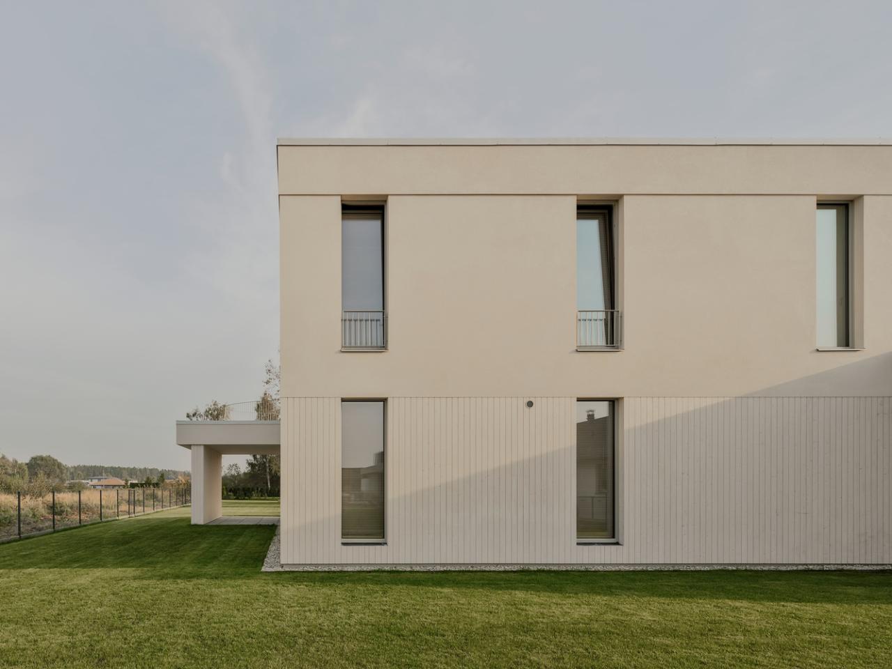 温暖自然流畅细节简洁线性对称韵律的极简别墅设计