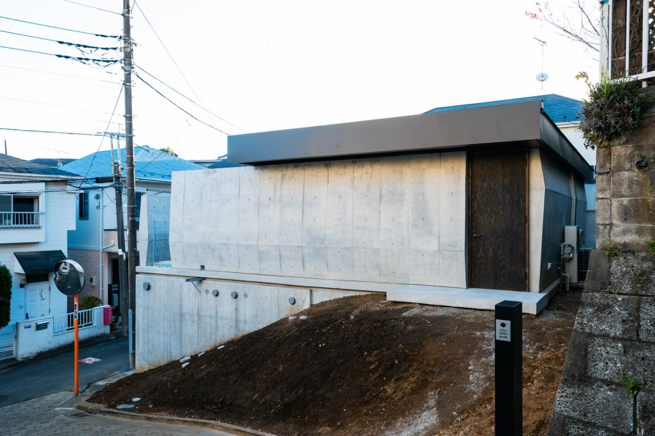 混凝土与木材交织的独特神秘体验静谧栖居的住宅设计