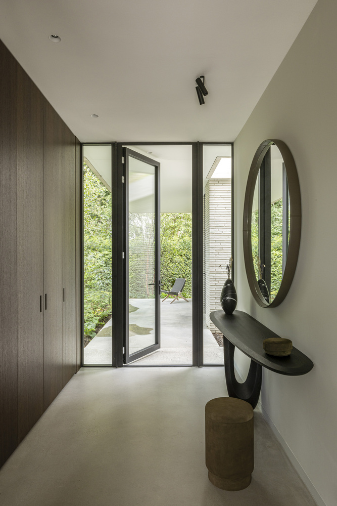 邂逅荷兰海岸隐匿别墅：一场自然、建筑与艺术的盛宴设计