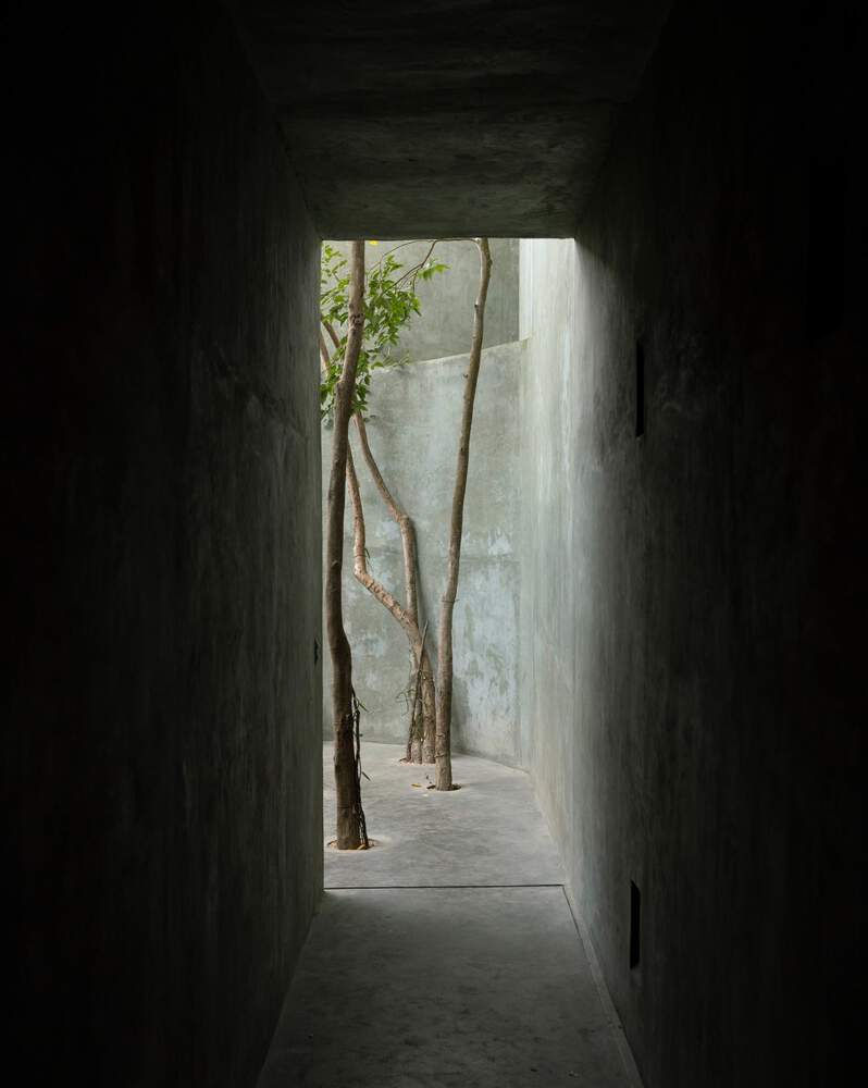 从天然井与洞穴汲取灵感光影交织下感知时间的度假屋设计