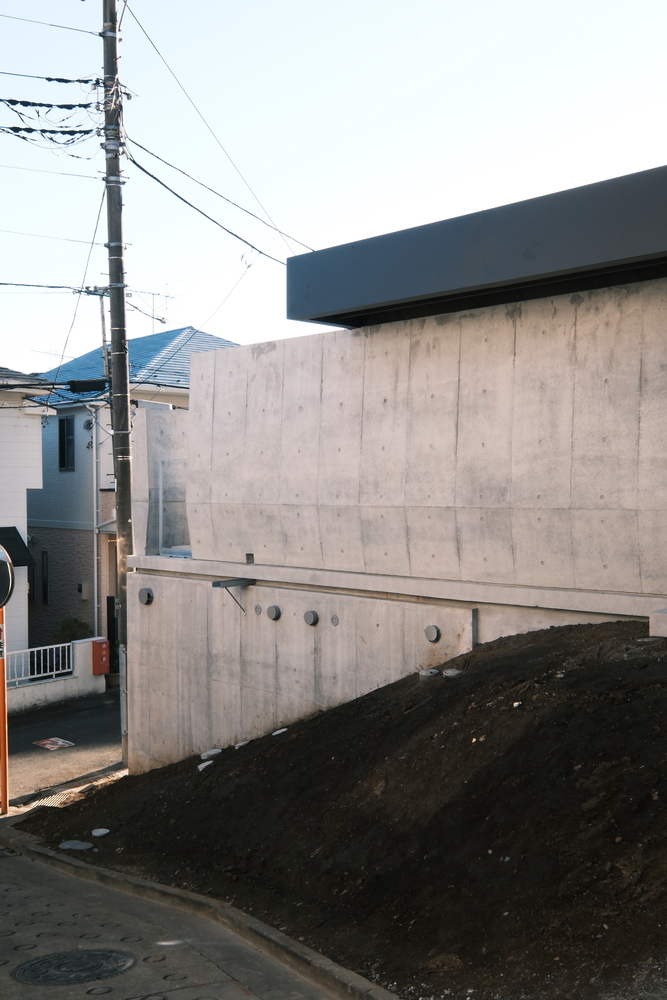 混凝土与木材交织的独特神秘体验静谧栖居的住宅设计