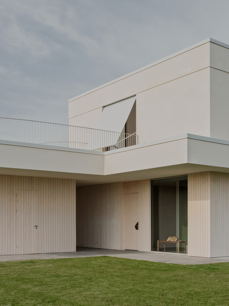 温暖自然流畅细节简洁线性对称韵律的极简别墅设计