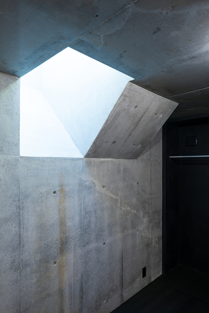 混凝土与木材交织的独特神秘体验静谧栖居的住宅设计