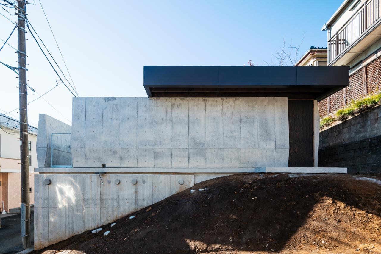 混凝土与木材交织的独特神秘体验静谧栖居的住宅设计