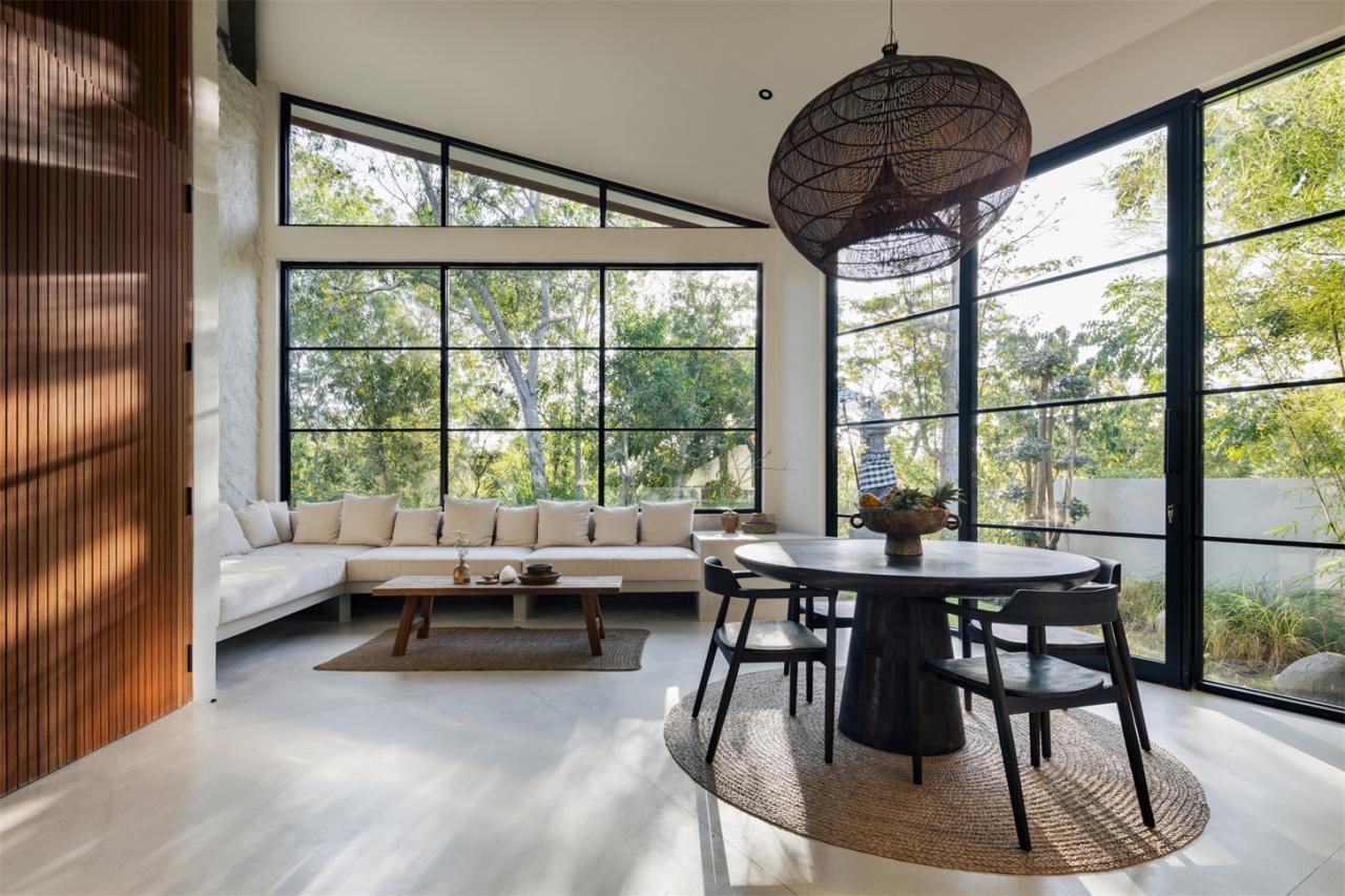 诗意森林里的侘寂之境翻转屋顶下的自然别墅设计