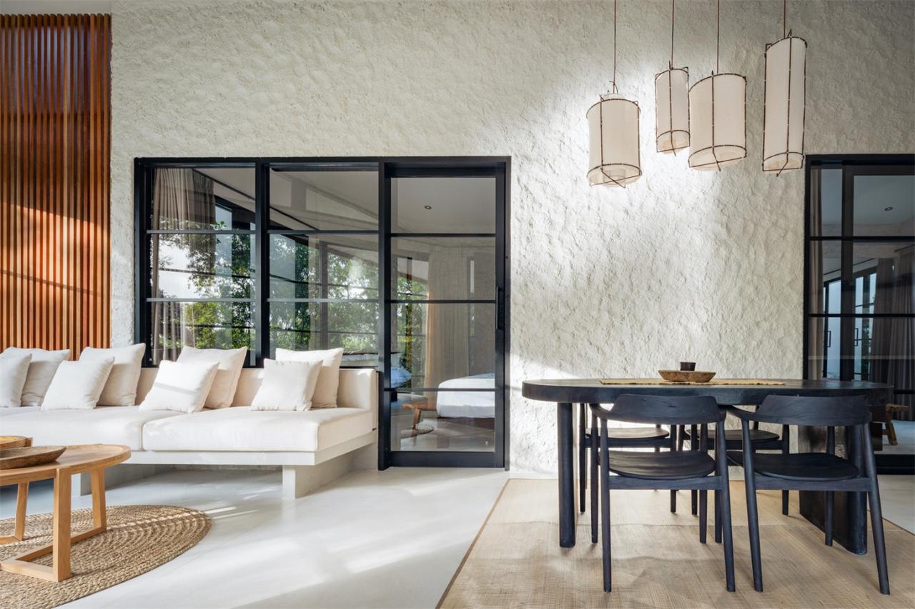 诗意森林里的侘寂之境翻转屋顶下的自然别墅设计